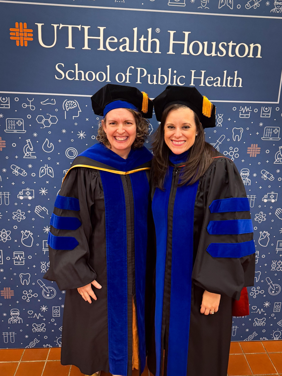 Belinda Hernandez, PhD, with fellow San Antonio faculty member Aubree Shay, PhD, at the 2025 School of Public Health commencement ceremony.
